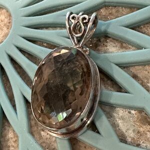 Sterling Silver Pendant with Faceted Oval Smoky Quartz